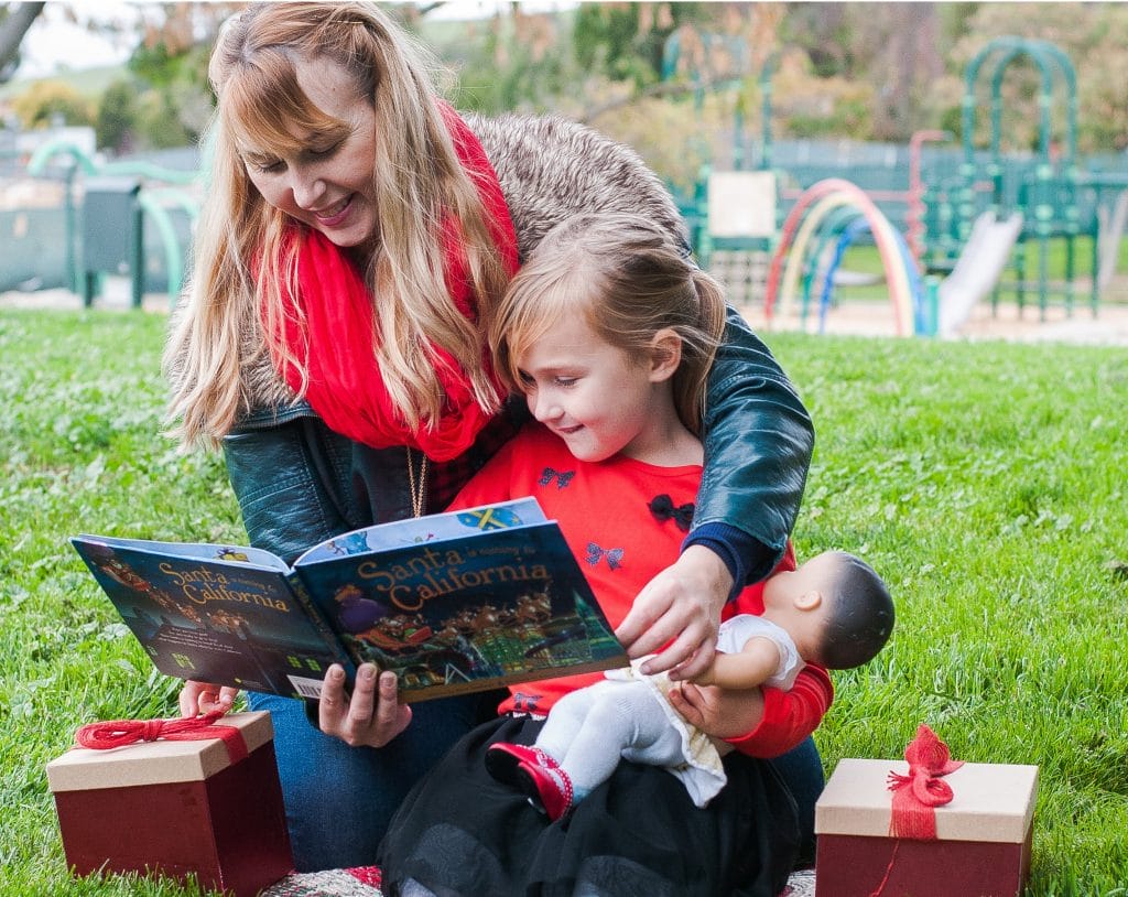 reading a Santa book to the kiddo