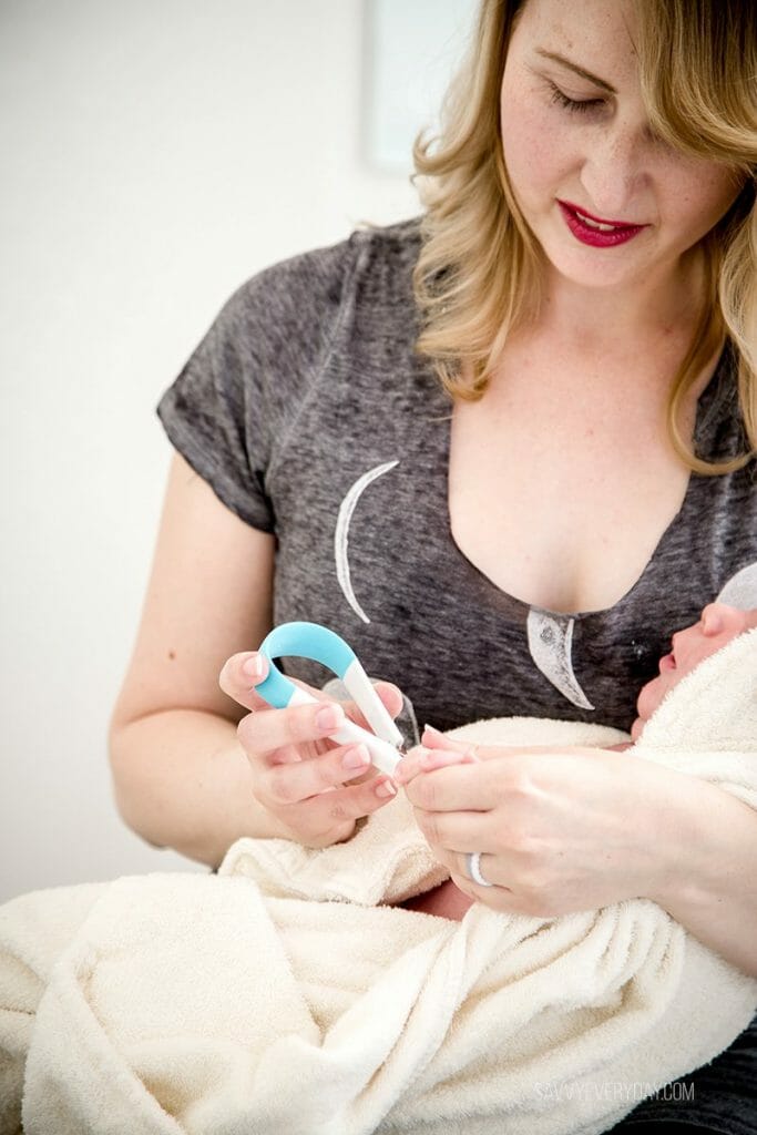 close up of cutting baby's nails