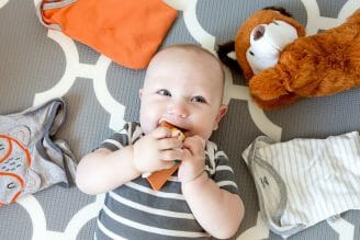 smiling at fox clothes flatlay