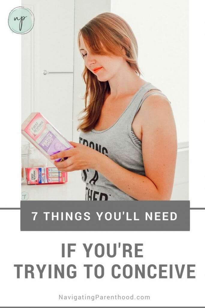 Wording: 7 Things You'll Need if You're Trying to Conceive, woman looking at ovulation test 7 Things You'll Need if You're Trying to Conceive