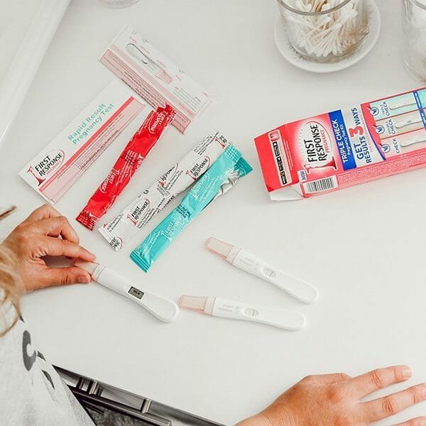 First Response triple check pregnancy test on counter