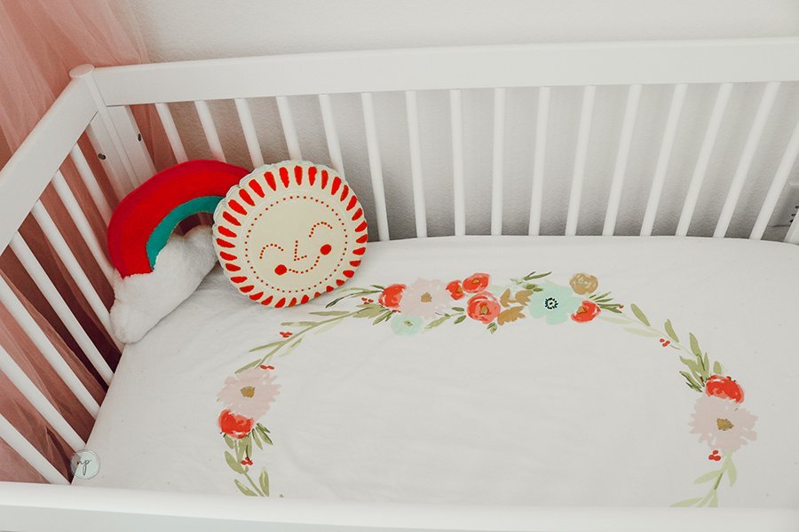 close up of floral bohemian crib
