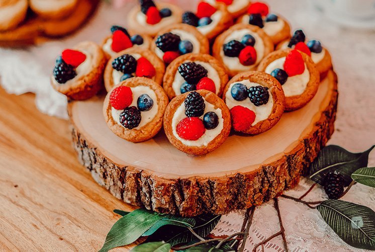 delicious fruit custards on wooden tray