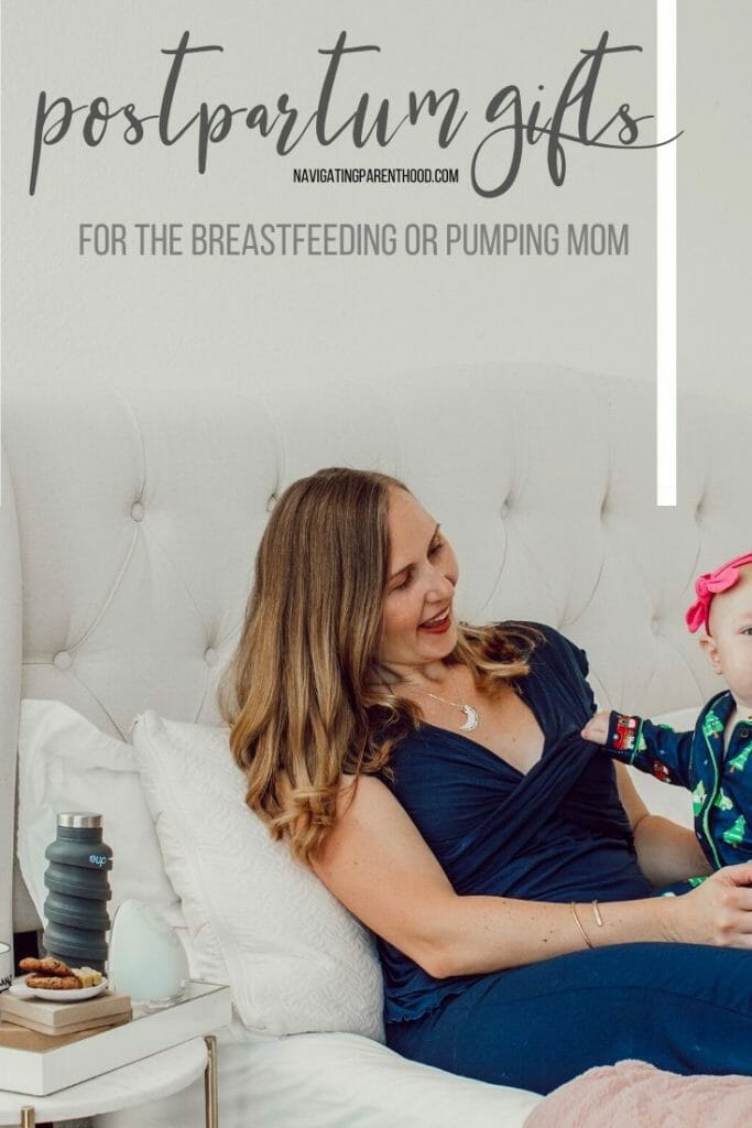 mom and baby sitting on bed in PJs