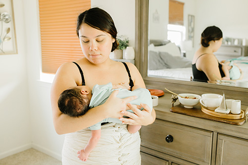 postpartum mom in belly bind