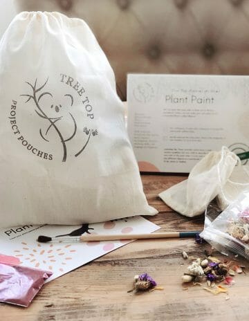 cotton bag sitting on table with dried flowers and recipe cards