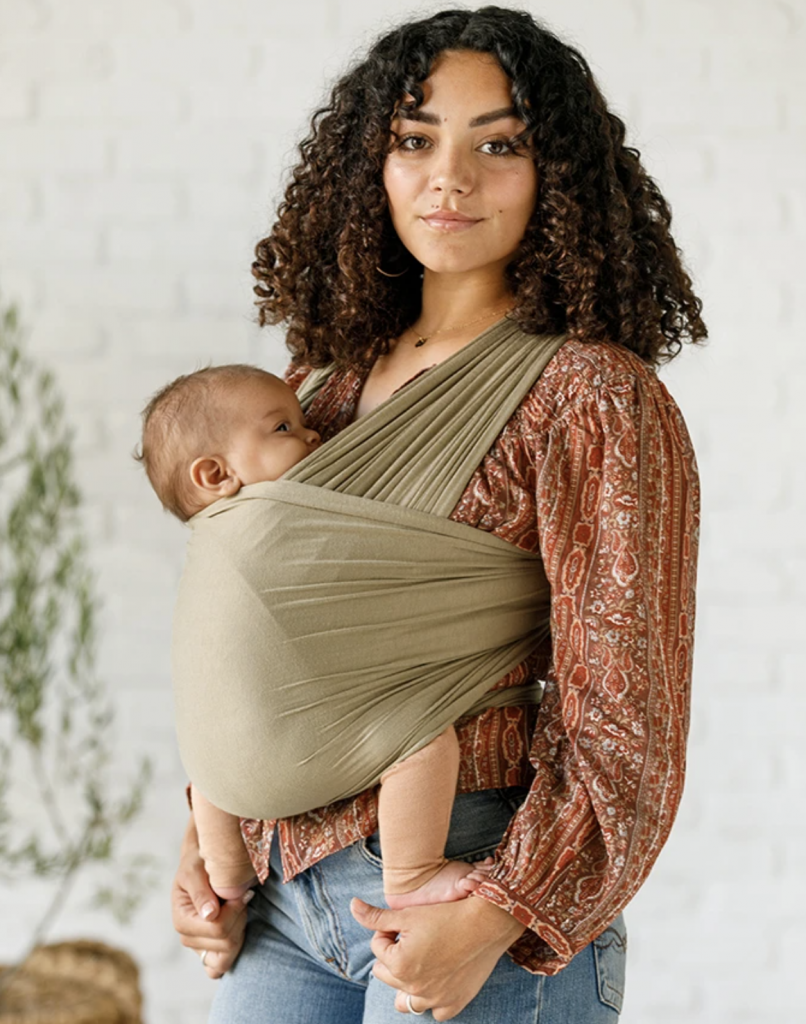 mom wears new baby in solly wrap