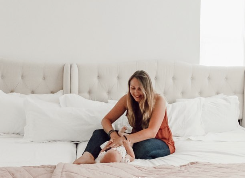 mom on bedsharing bed with baby