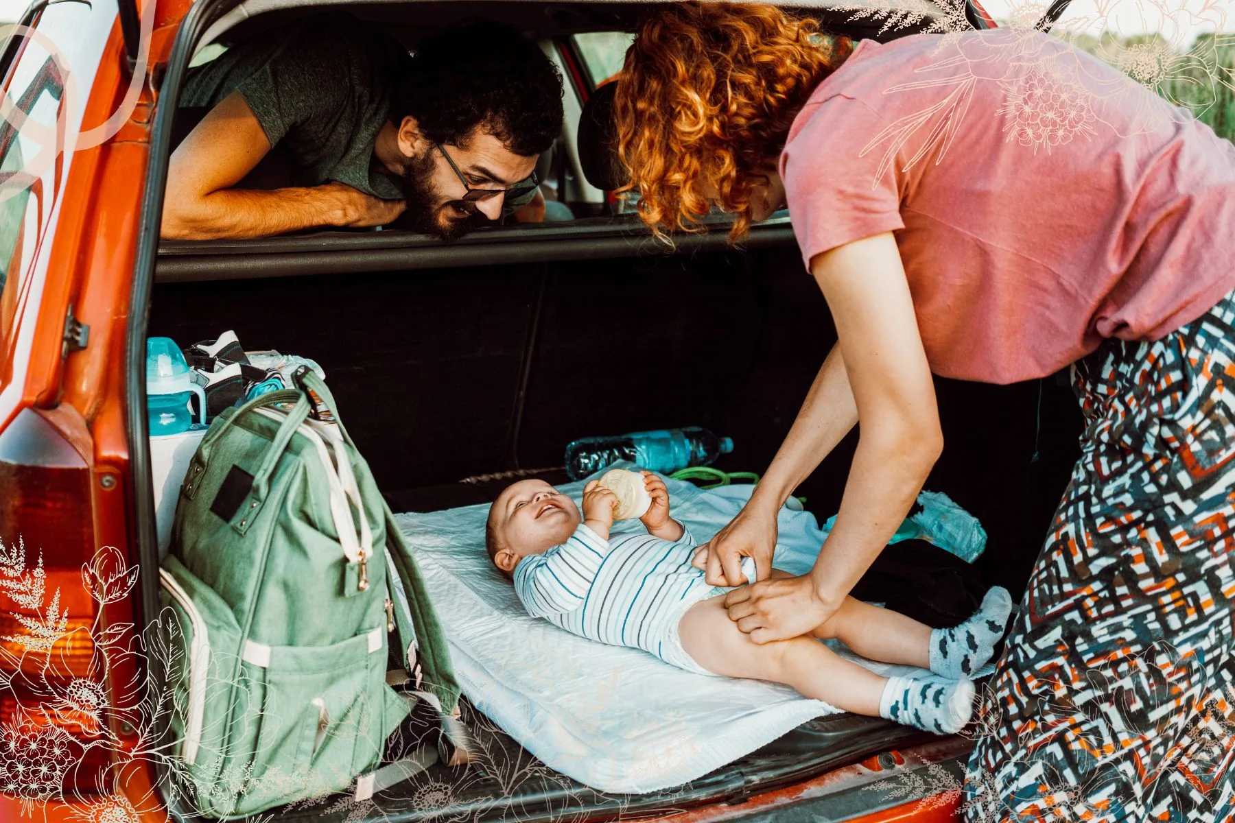 family traveling in the car-diaper change